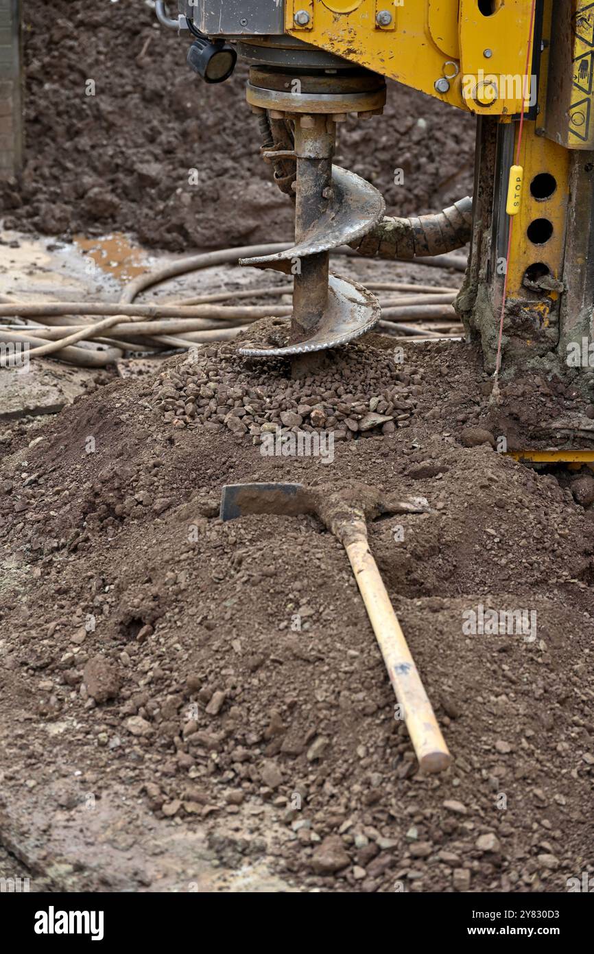 Mattock per perforatrice a trivella utilizzata per rimuovere il terreno dalla perforazione Foto Stock