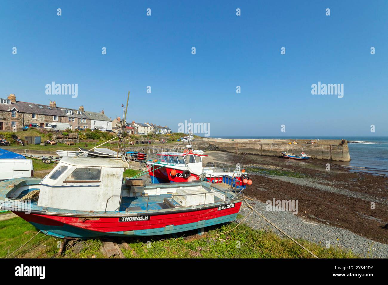 Barche da pesca nel porto di Craster, northumberland, regno unito Foto Stock