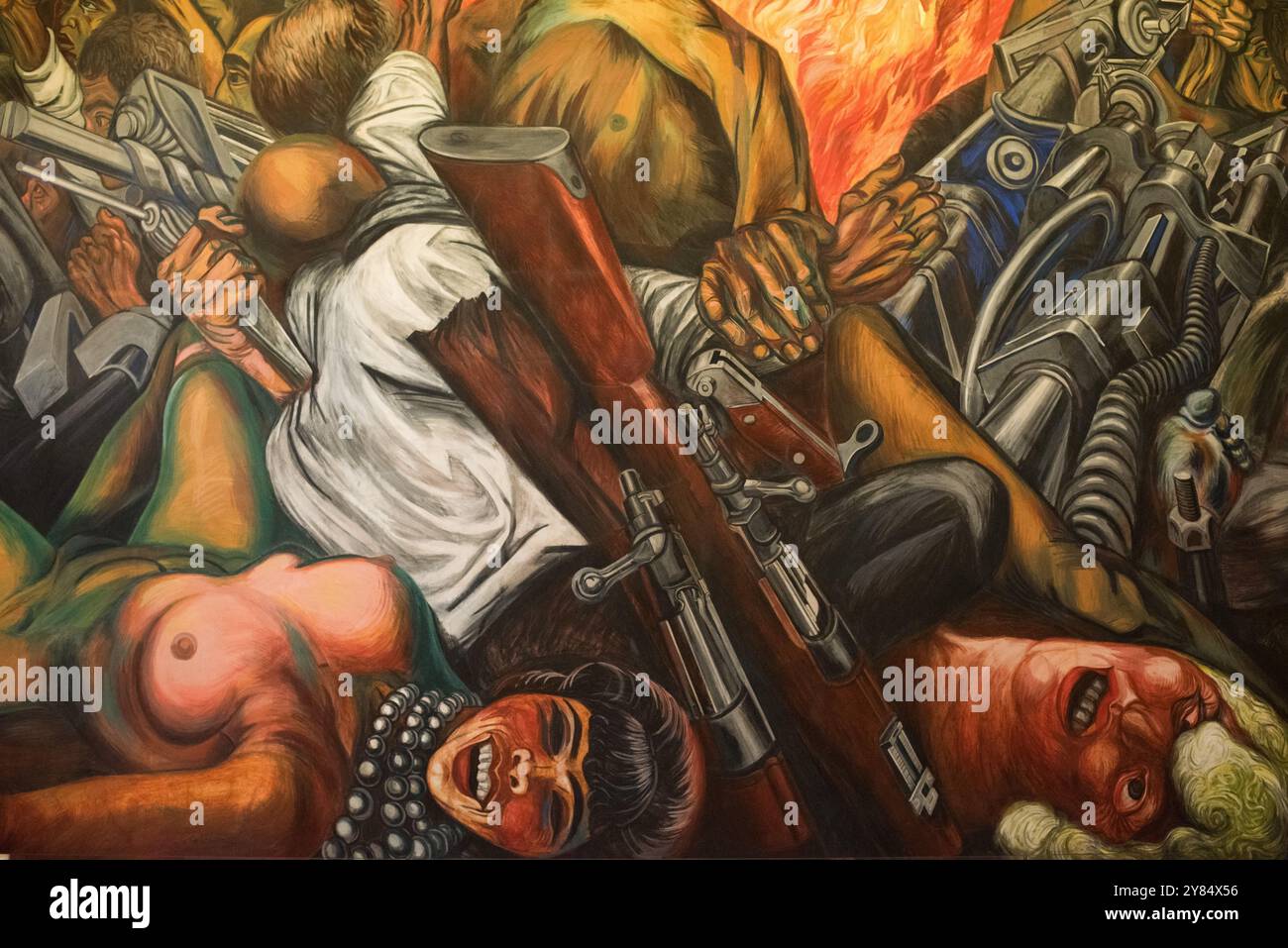 CITTÀ DEL MESSICO, Messico — Un segmento di un dipinto murale del 1934-35 di Jose Clemente Orozco intitolato "Catharsis" (Katharsis). Il Palacio de Bellas Artes ospita il Teatro Nazionale del Messico. Con un esterno che è un mix di stile neo-classico e Art Nouveau e un interno che è Art Deco, è ampiamente considerato l'edificio più bello di città del Messico. Risale all'inizio del XX secolo ed è nel quartiere storico di città del Messico, dichiarato patrimonio dell'umanità dall'UNESCO. Foto Stock