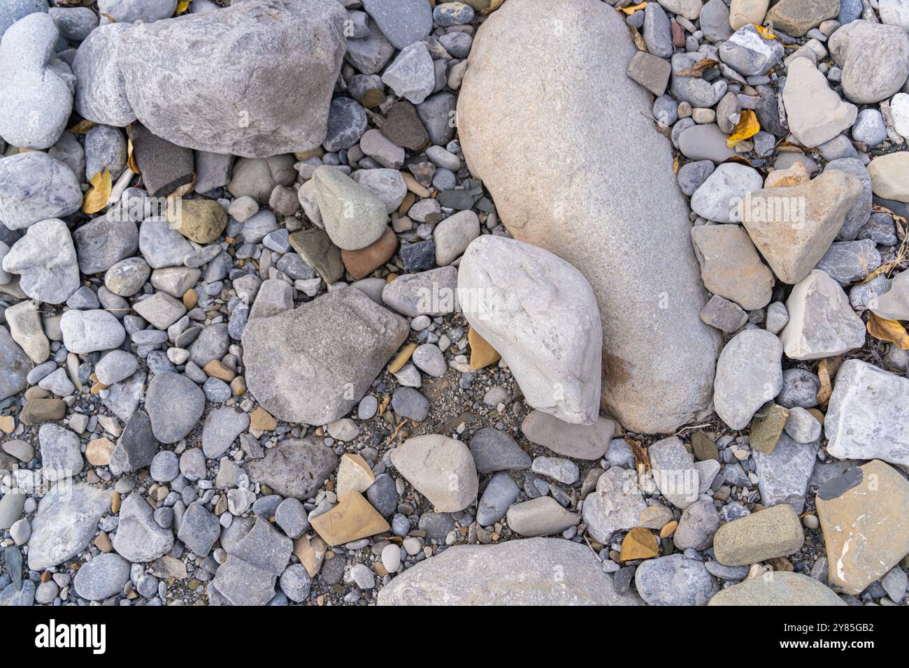 Raccolta di rocce pietre e ciottoli come sfondo Foto Stock
