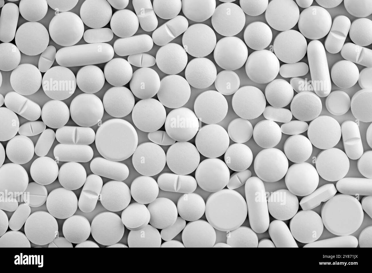Gruppo di molti farmaci pillole bianche macro shot Foto Stock