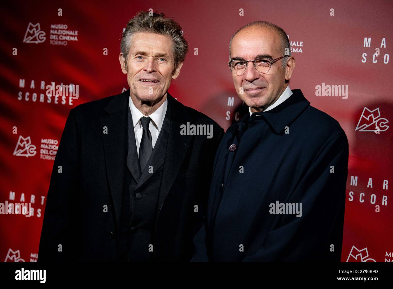 Torino, Italia. 7 ottobre 2024. L'attore americano William Dafoe e i registi italiani Giuseppe Tornatore assistono a un Red carpet davanti al regista americano Martin Scorsese che riceve il premio Star of the Mole in una cerimonia di gala nell'atrio-tempio alto 85 metri della casa del museo, la Mole Antonelliana, a Torino, nel nord-ovest Italia - lunedì 7 ottobre 2024. Notizie (foto di Marco Alpozzi/Lapresse) credito: LaPresse/Alamy Live News Foto Stock