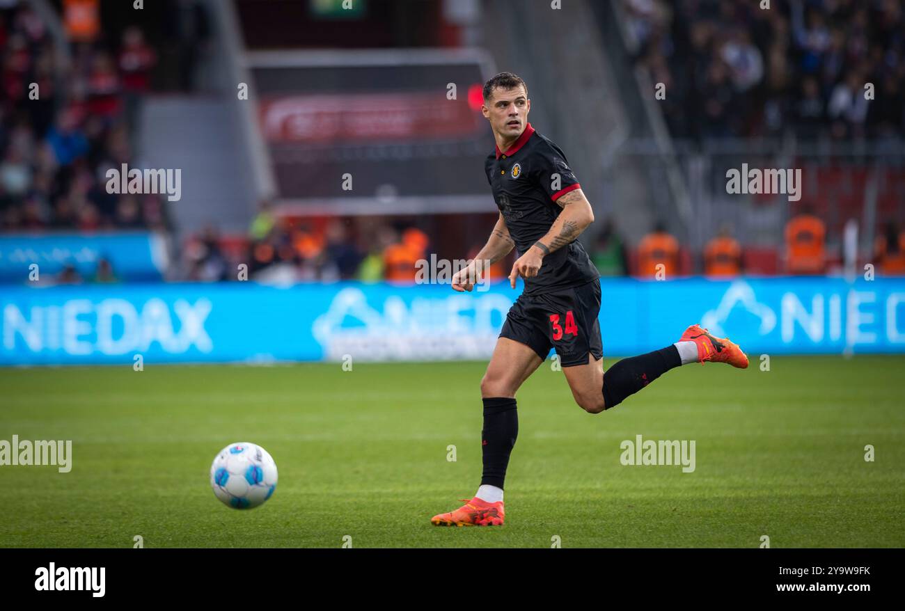 Leverkusen, Germania. 5 ottobre 2024. Granit Xhaka (LEV) Bayer Leverkusen - Holstein Kiel 05.10.2024 Copyright (nur für journalistische Zwecke) di : Foto Stock