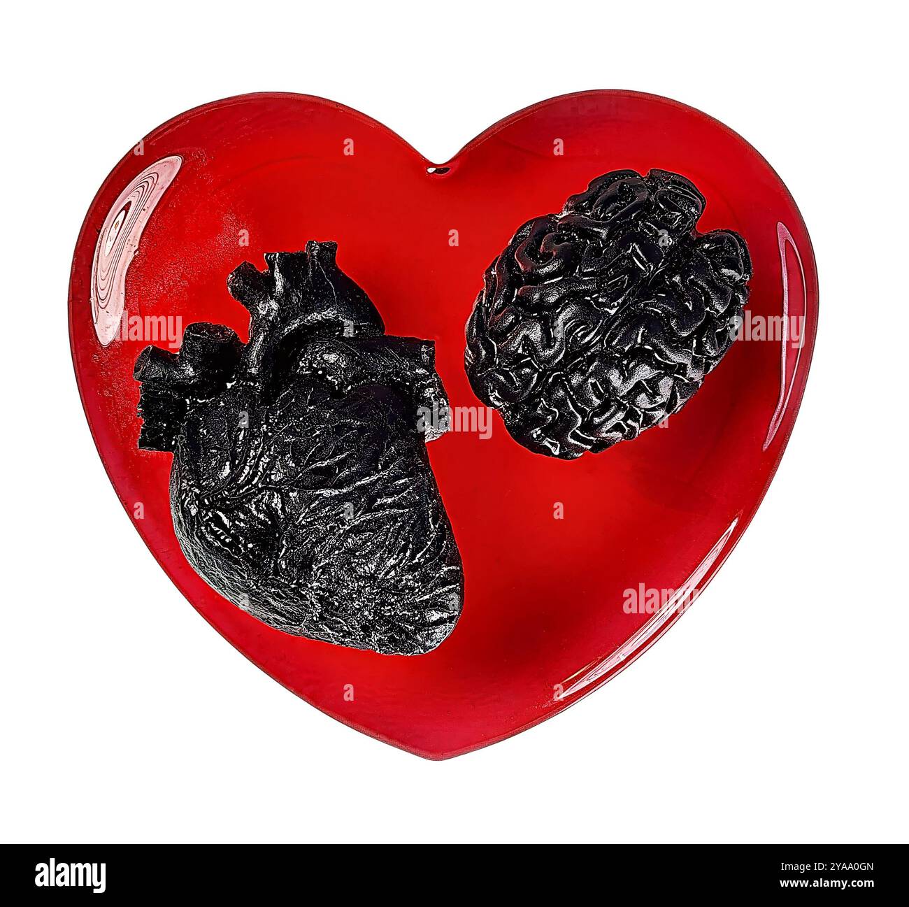 Quando l'amore annerisce il cuore e la mente sopra un cuore rosso Foto Stock