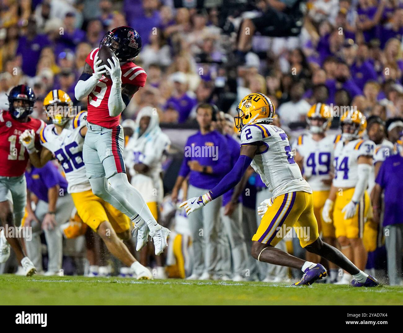 Baton Rouge, Stati Uniti. 12 ottobre 2024. Il cornerback OLE Miss TREY AMOS (9) intercetta un passaggio nel quarto periodo durante la partita tra Ole Miss Rebels e i LSU Tigers il 12 ottobre 2024 al Tiger Stadium di Baton Rouge, Louisiana. (Foto di: Jerome Hicks/Sipa USA) credito: SIPA USA/Alamy Live News Foto Stock