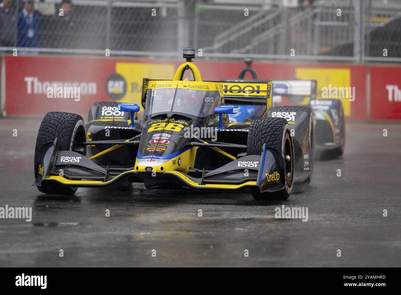 Il pilota DELLA INDYCAR Series, COLTON HERTA (26) di Valencia, California, viaggia attraverso le curve durante una sessione di prove bagnate e pericolose per la Big ma Foto Stock