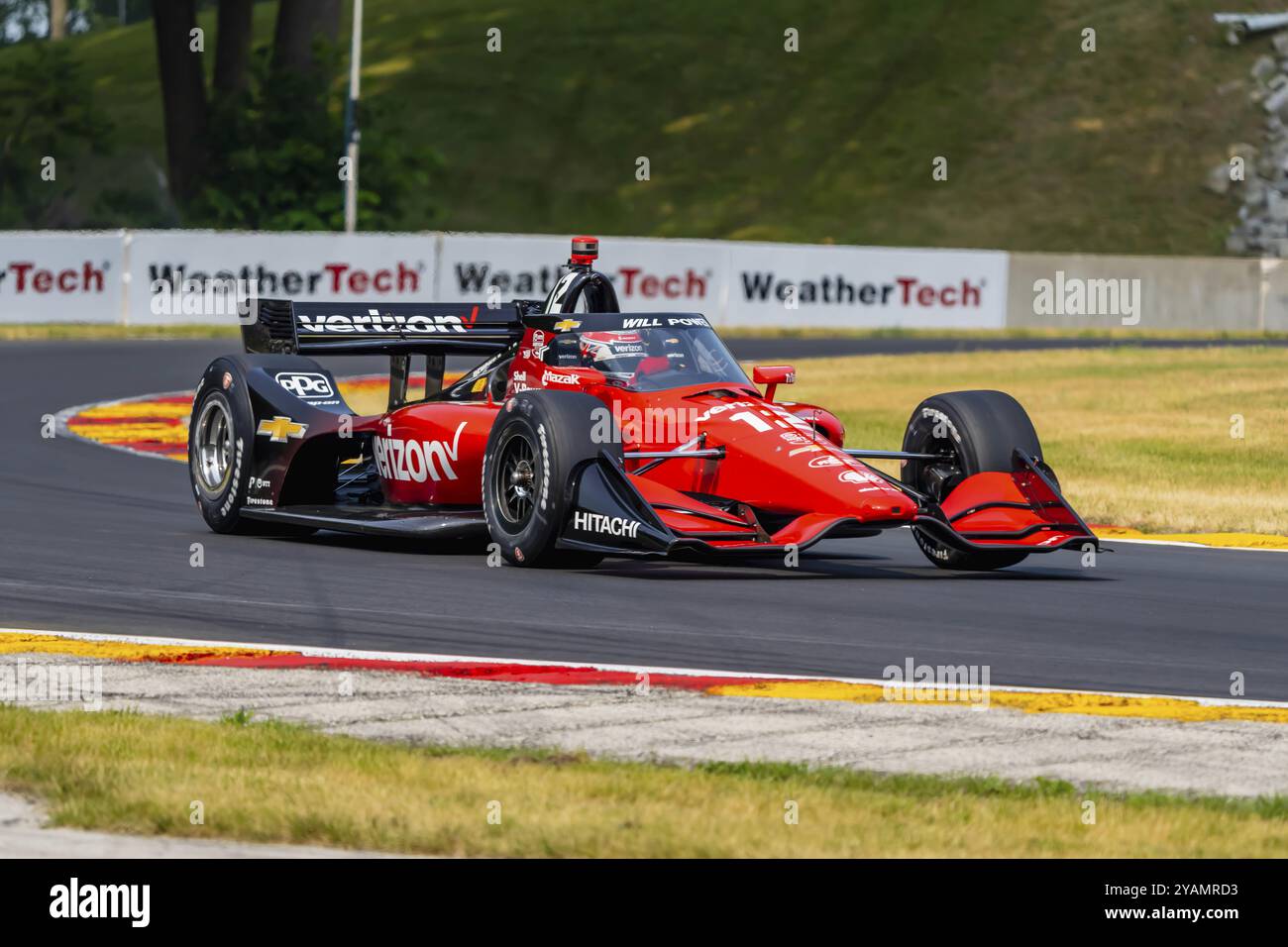 WILL POWER (12) di Toowoomba, Australia viaggia attraverso le curve durante una pratica per il Gran Premio di Sonsio a Road America a Elkhart Lake WI Foto Stock