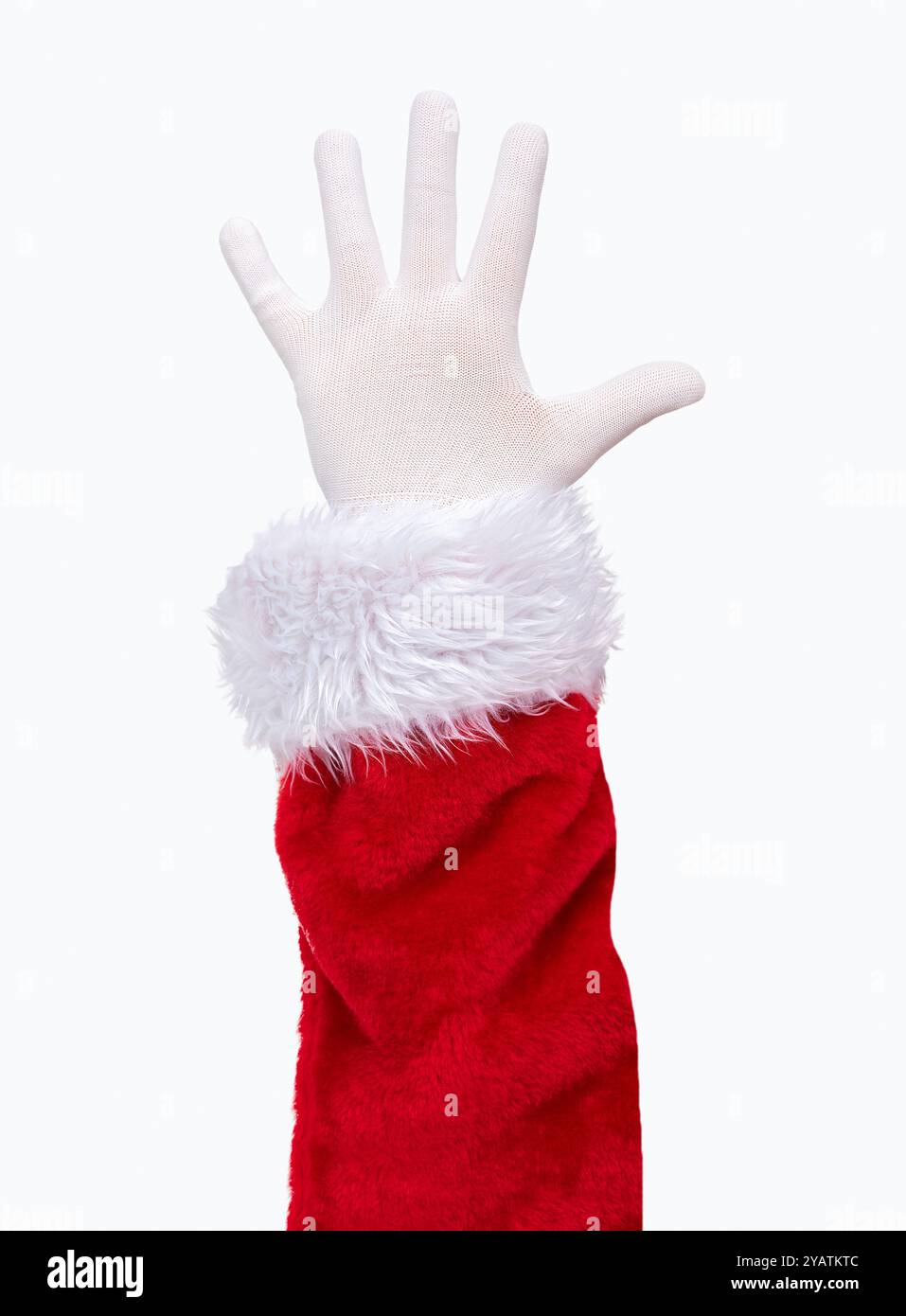 Foto di una mano di Babbo Natale davanti isolata su bianco Foto Stock