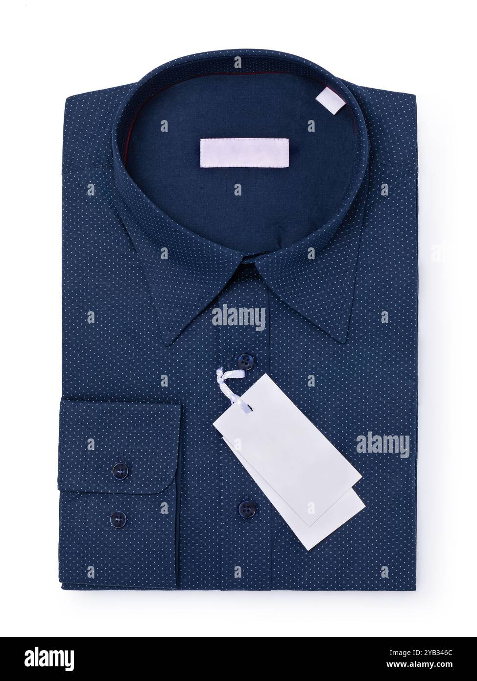 Camicia a maniche lunghe in tessuto blu scuro con motivo a punti bianco sul tessuto, isolata su sfondo bianco, vista dall'alto Foto Stock