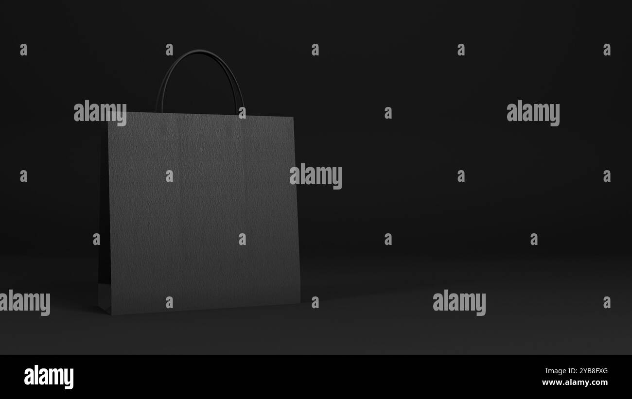 Shopping bag nera su sfondo nero minimalista. Un design elegante e senza tempo, perfetto per creare composizioni visive per marchi di lusso. Foto Stock