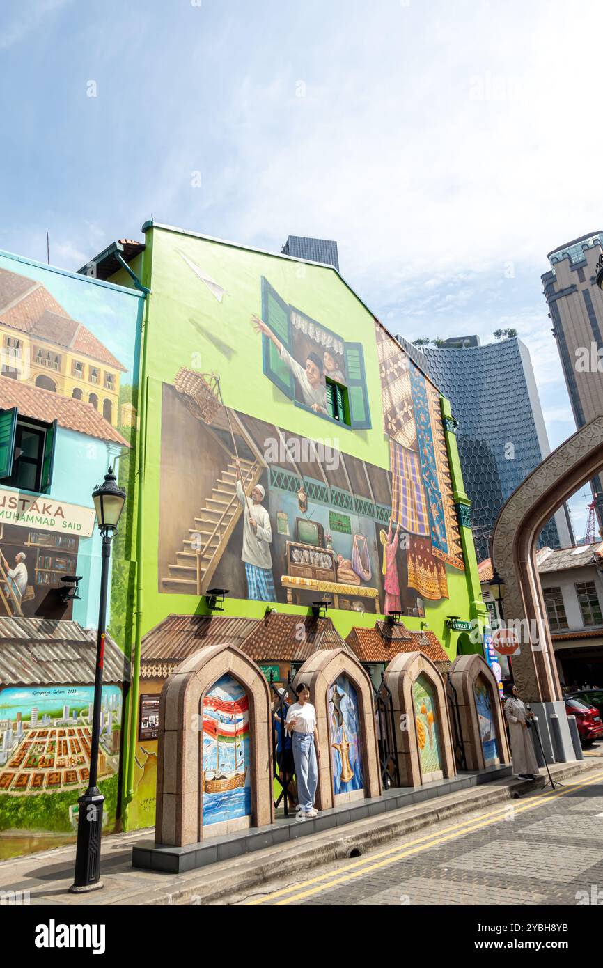 Murale in via Muscat che raffigura una tradizionale attività commerciale, la via araba attraversa Singapore Foto Stock
