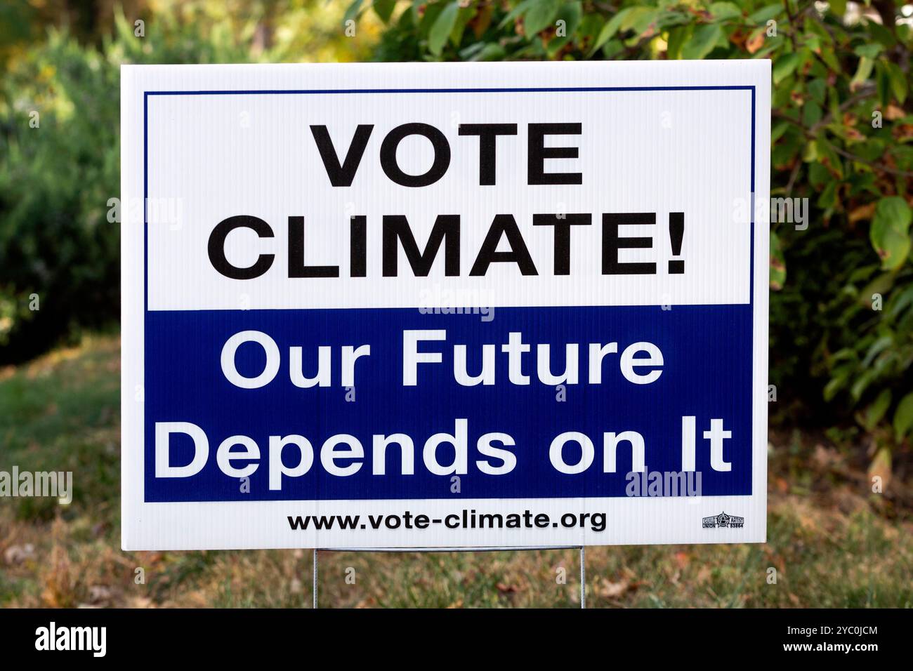 Stati Uniti non partigiano crisi climatica firma cantiere elettorale che afferma: "Vota clima, il nostro futuro dipende da esso". Foto Stock