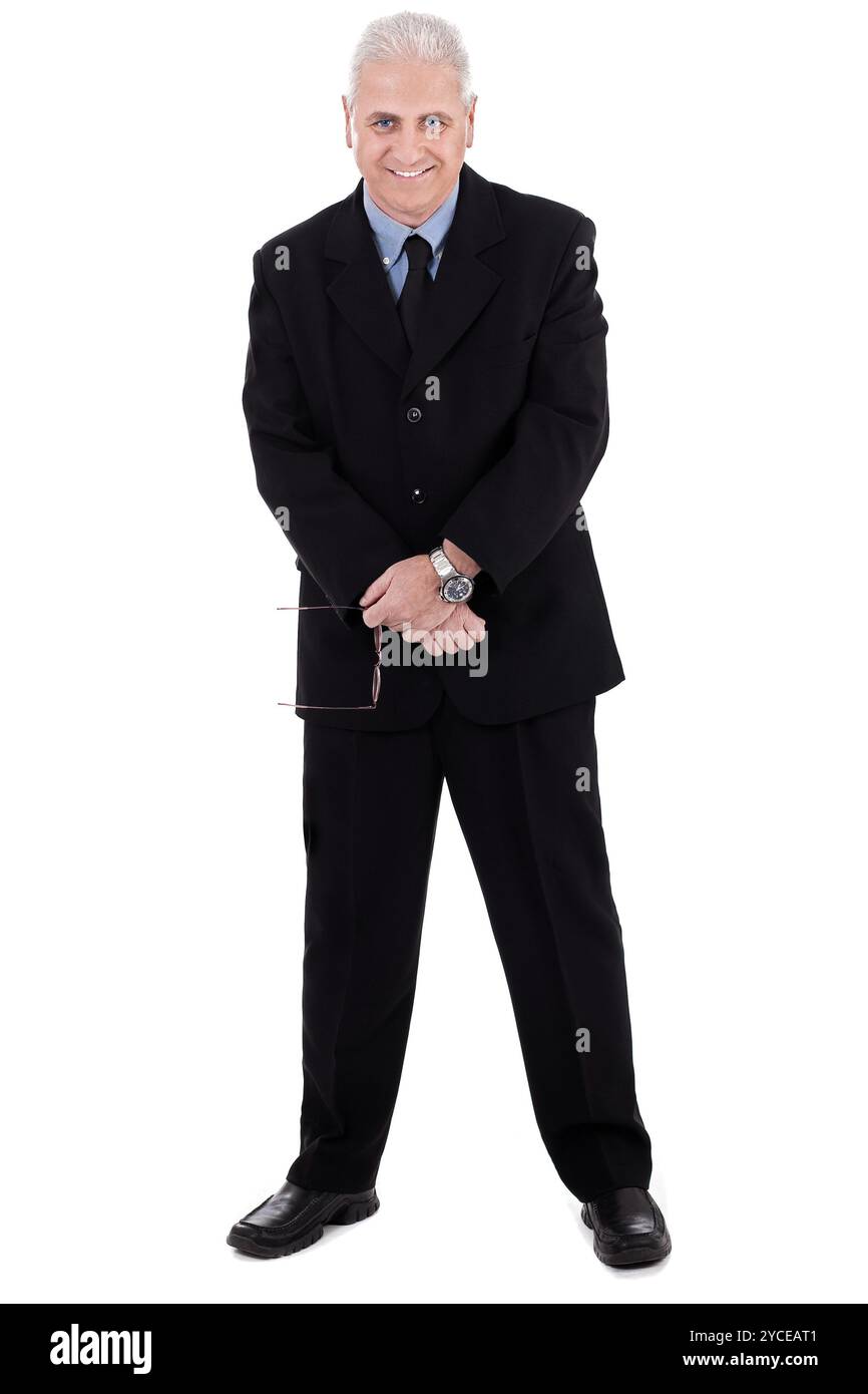 Isolato bello maturare business man standing su sfondo bianco Foto Stock