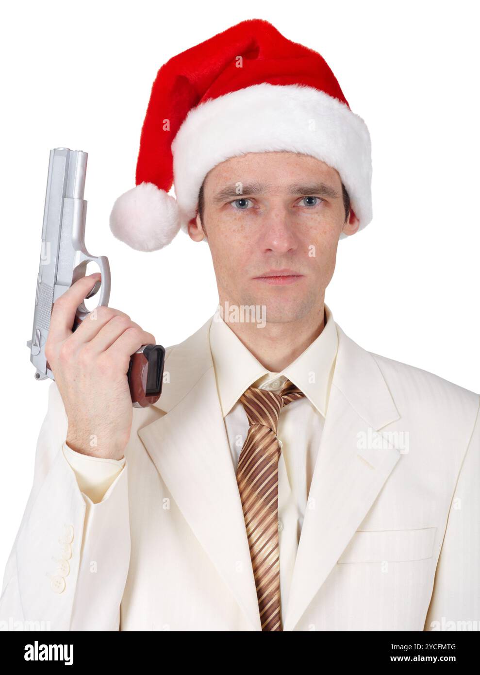 Giovane col cappello di Natale con la pistola Foto Stock