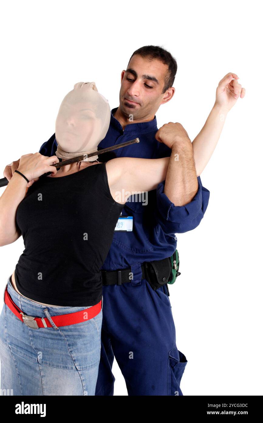 Arrestare un ladro o un criminale Foto Stock