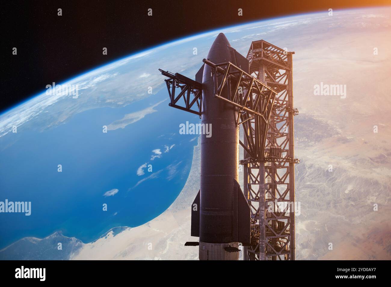 Heavy Starship sulla piattaforma di lancio sul pianeta Terra sfondo con stelle. Elementi di questa immagine forniti dalla NASA. Foto Stock