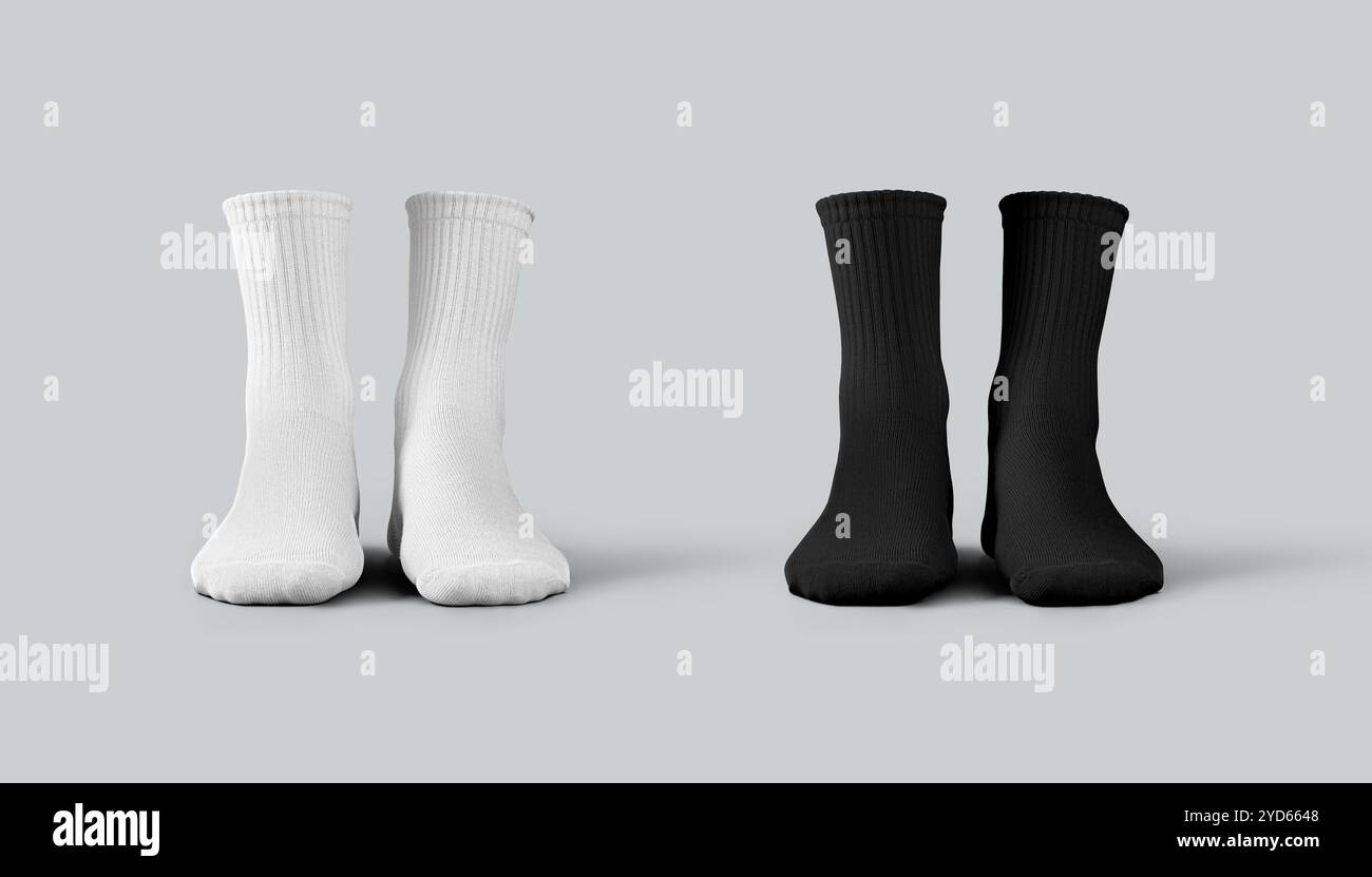 Mockup di calzini bianchi medi, neri rendering 3D, abbigliamento alla moda per gambe, isolati sullo sfondo. Set di abbigliamento sportivo per i piedi, vista frontale. Guaina protettiva Foto Stock