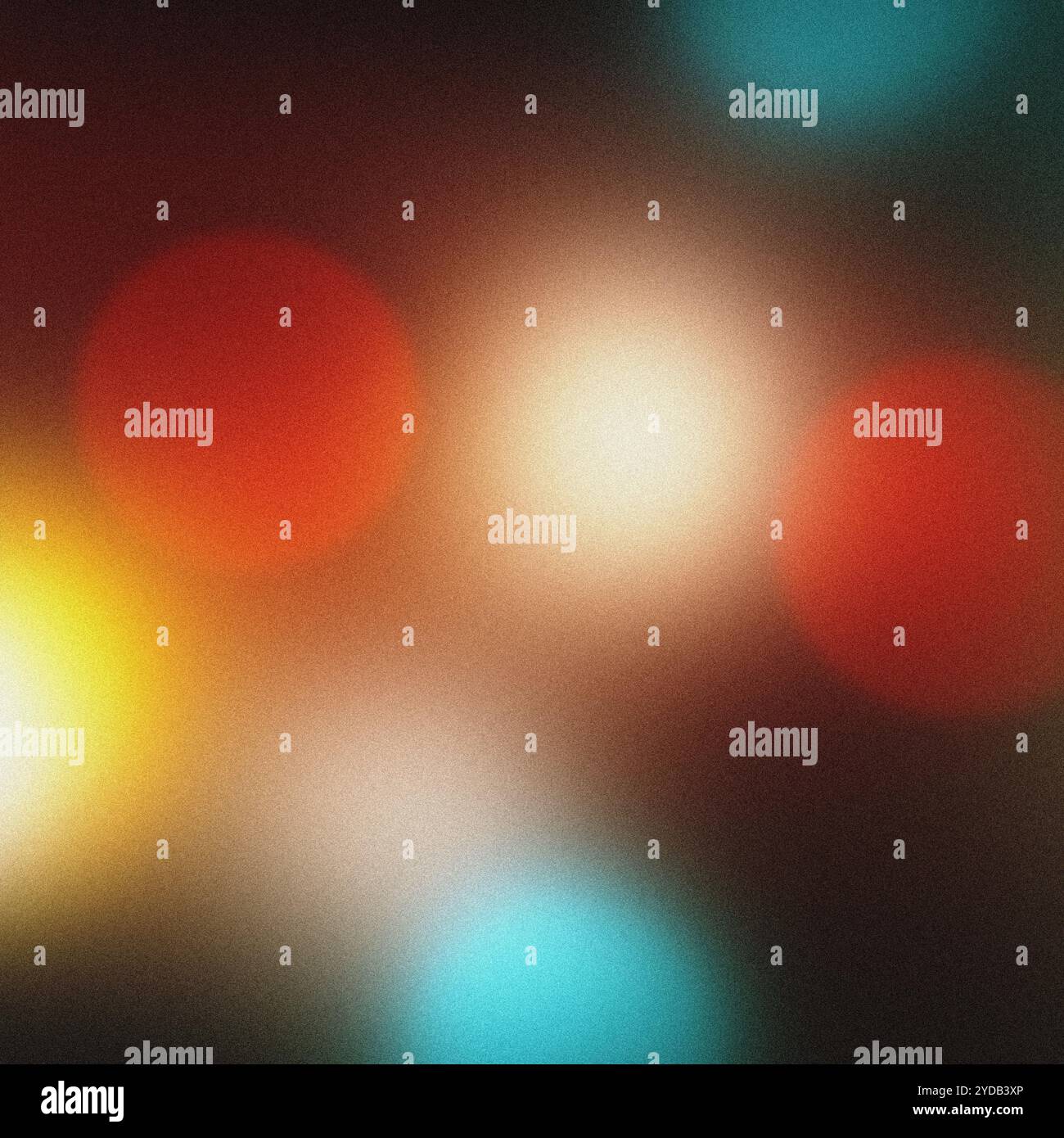 Sfondo sgranato con luci bokeh colorate che creano un'atmosfera festosa Foto Stock