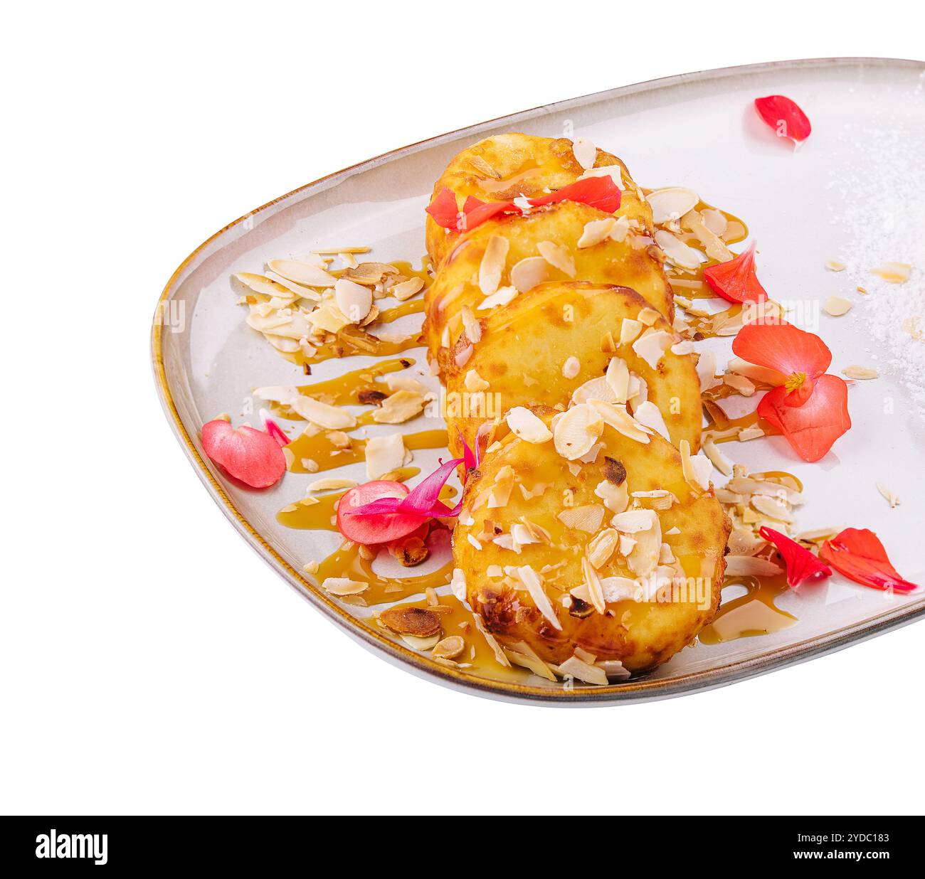 Frittelle di formaggio fresco con miele e mandorle Foto Stock