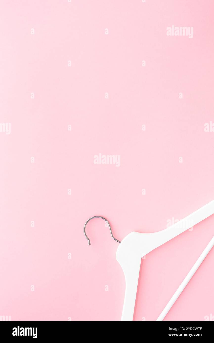 Grucce bianche su sfondo rosa pastello Foto Stock