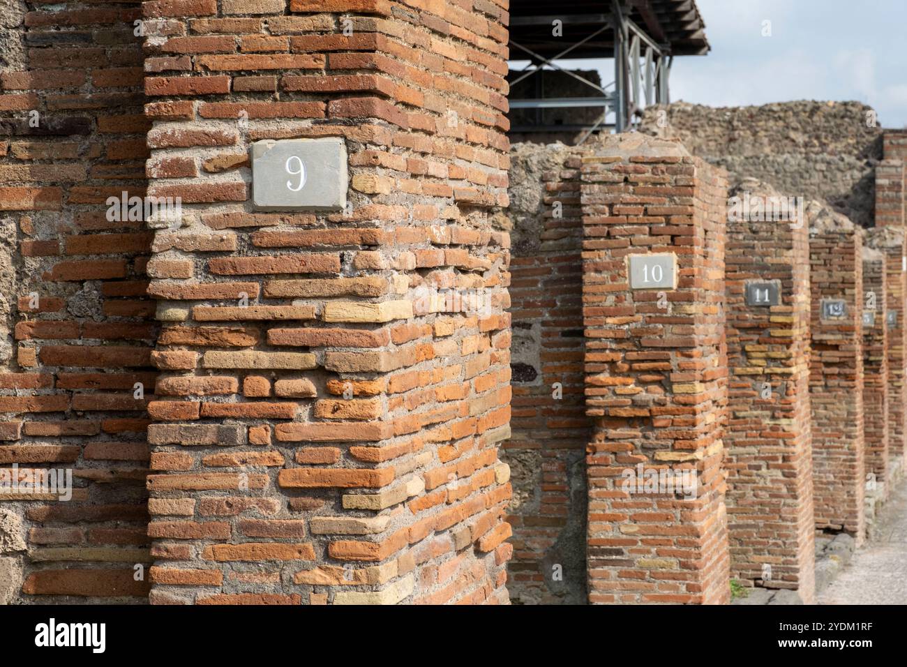 Strade in rovina la città romana di Pompei a Pompei Scavi, vicino napoli, Italia meridionale. Foto Stock