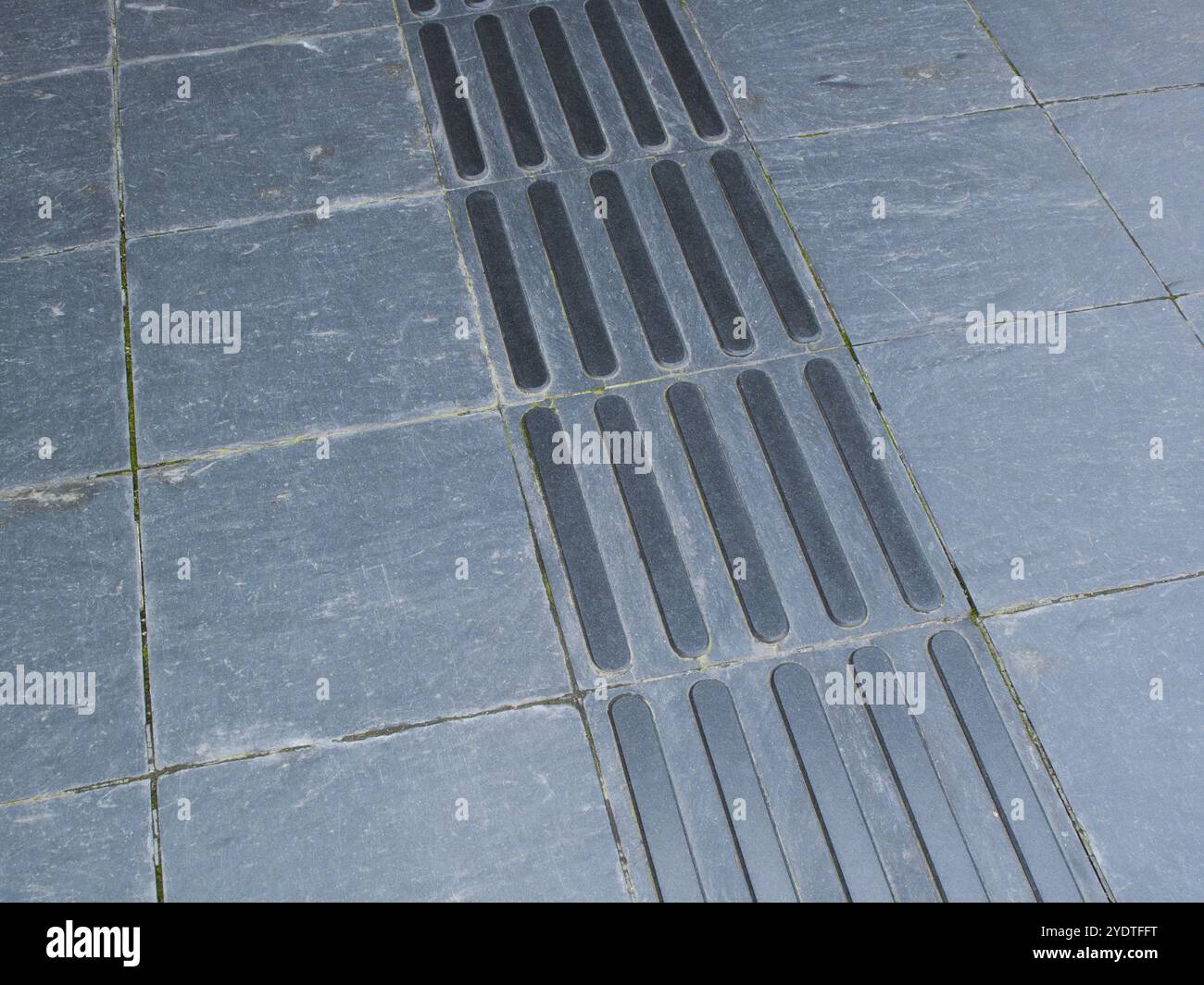 Blocco Braille con piastrelle di pietra Foto Stock