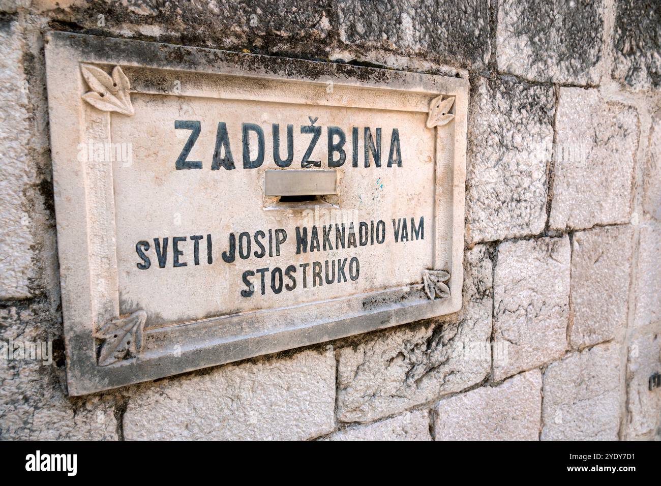 Dubrovnik Croazia, città vecchia di Stari Grad, città murata di Ragusa, via Ulica Svetog Josipa, slot per le donazioni, Chiesa di San Giuseppe Crkva sv. Josip, cattolico, CR Foto Stock