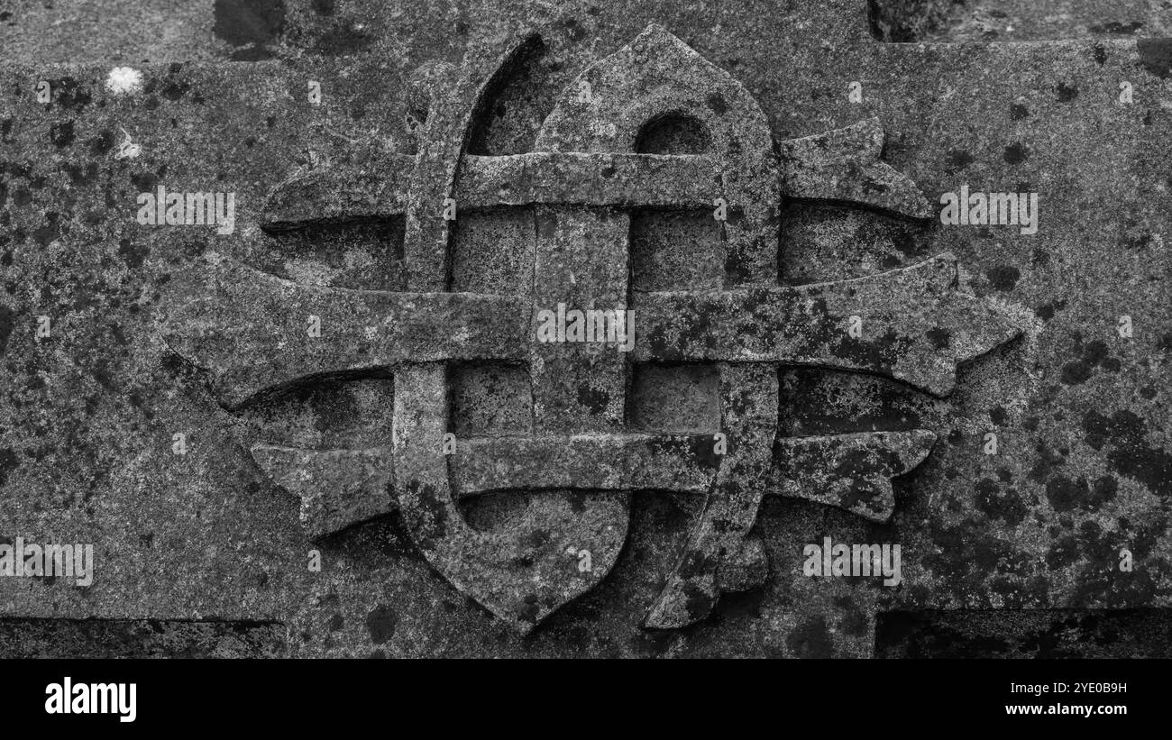 Pietra incisa con simbolo IHS Foto Stock