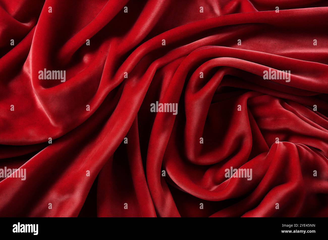 Chiffon, satinato e materiale lucido. vista dall'alto. pieghe in tessuto leggero. Matrimonio e sfondo di lusso. Sfondo di lusso rosso, velluto rosso. Foto Stock