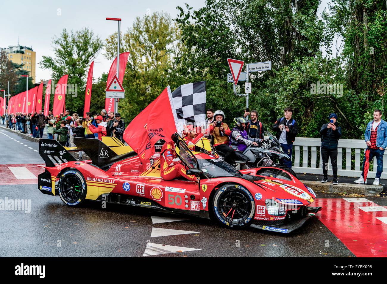 Antonio fuoco (ITA), Miguel Molina (ESP) e Nicklas Nielsen (DNK) sulla Ferrari 50 Hypercar durante la Parata in onore della vittoria di le Mans 24h 2024 prima di entrare nel circuito internazionale Enzo e Dino Ferrari di Imola. Foto Stock
