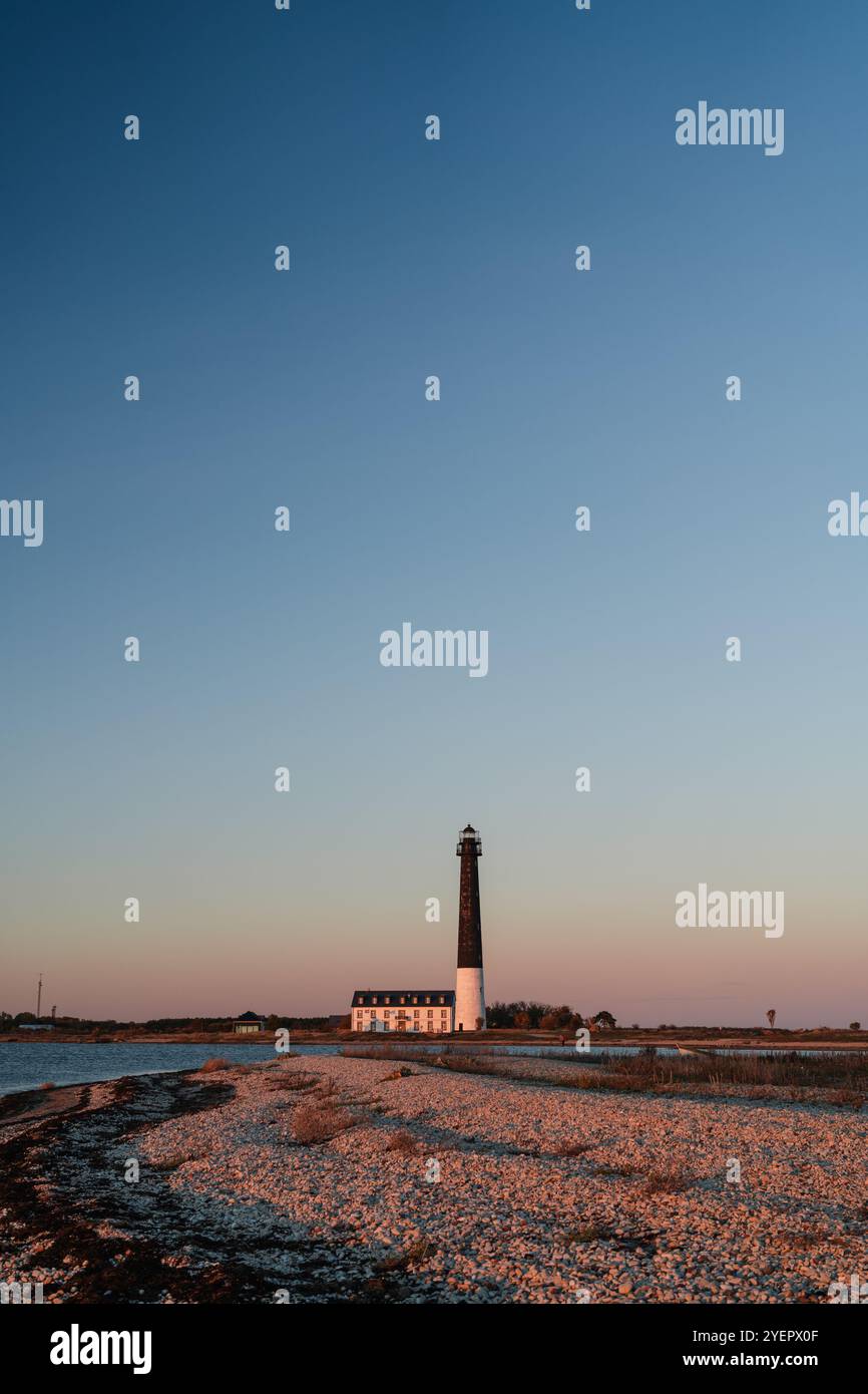 Faro al tramonto, contea di Saare, Estonia Foto Stock