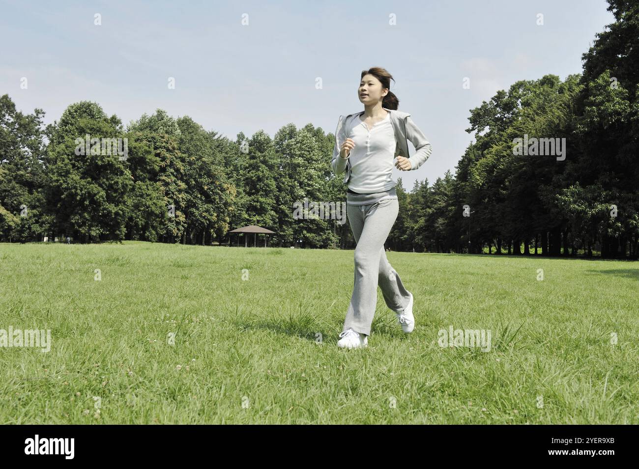 Uomo e donna che fanno esercizio preparatorio Foto Stock