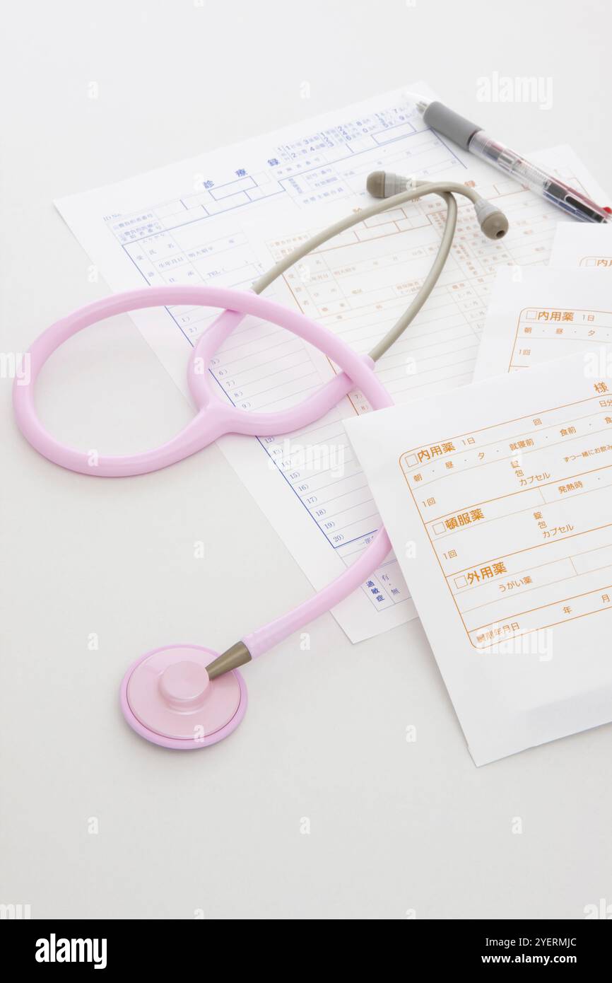 Stetoscopio e cartelle cliniche Foto Stock