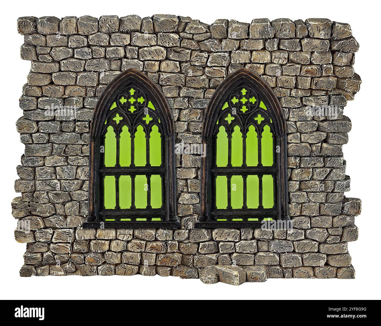 Vetrate gotiche verdi su un muro di castello o chiesa Foto Stock