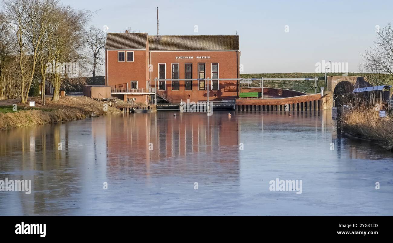 Schoepfwerk, Greetsiel, Krummhoern, Frisia orientale, Germania, Europa Foto Stock