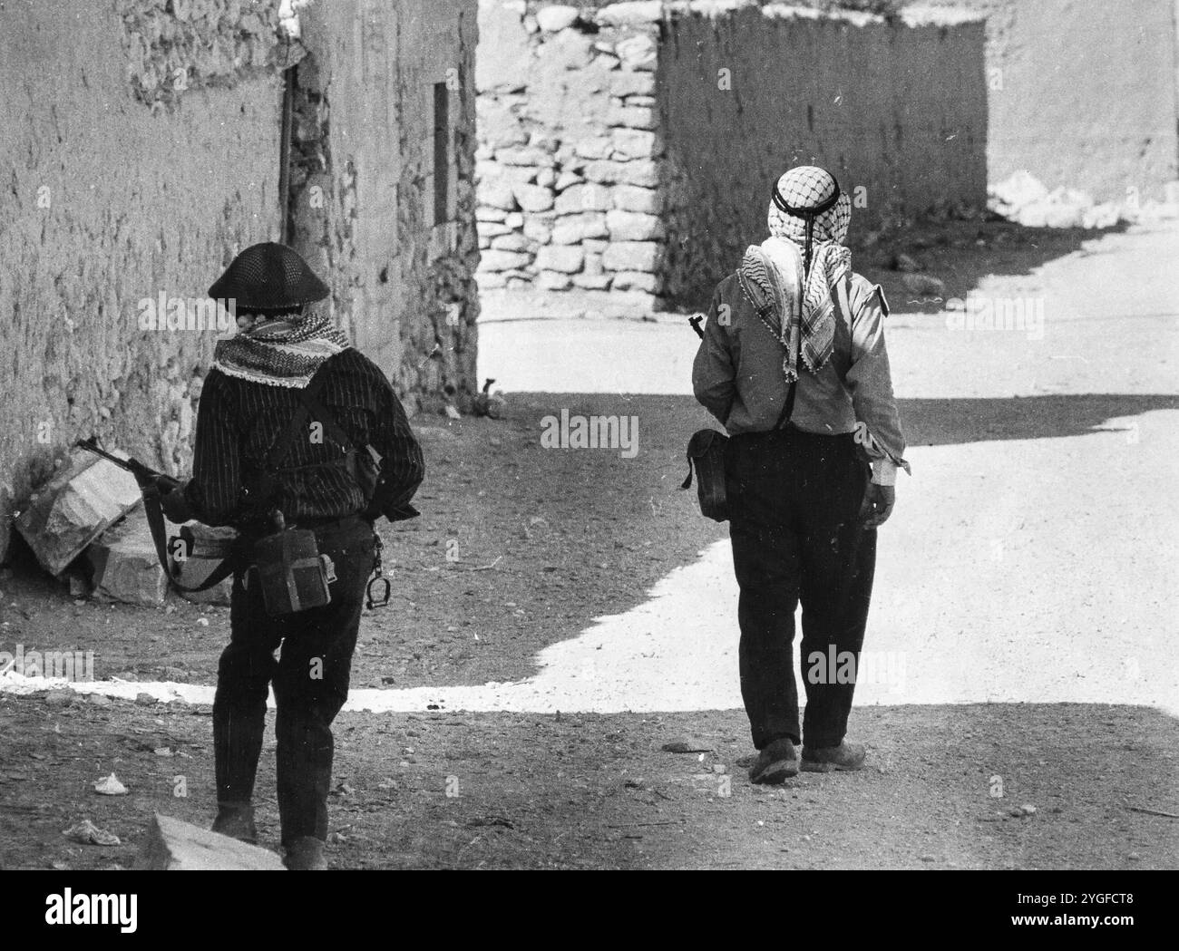 Giordania. Guerriglieri palestinesi che combattono contro le forze dell'esercito giordano, durante l'offensiva militare della Giordania contro i combattenti palestinesi nel 1970. Settembre Nero è un conflitto scoppiato nel Regno hascemita di Giordania tra le forze armate giordane e l'Organizzazione per la Liberazione palestinese nel settembre 1970, con scontri che continuarono fino a metà luglio 1971 Foto Stock