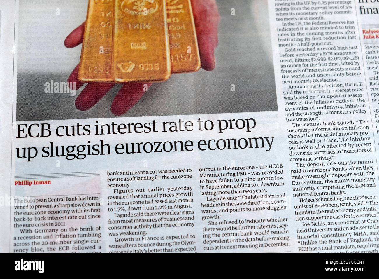 "La BCE taglia i tassi di interesse per sostenere la lentezza dell'economia dell'eurozona" titolo del quotidiano Guardian Business article18 ottobre 2024 Londra Inghilterra Regno Unito Europa Foto Stock