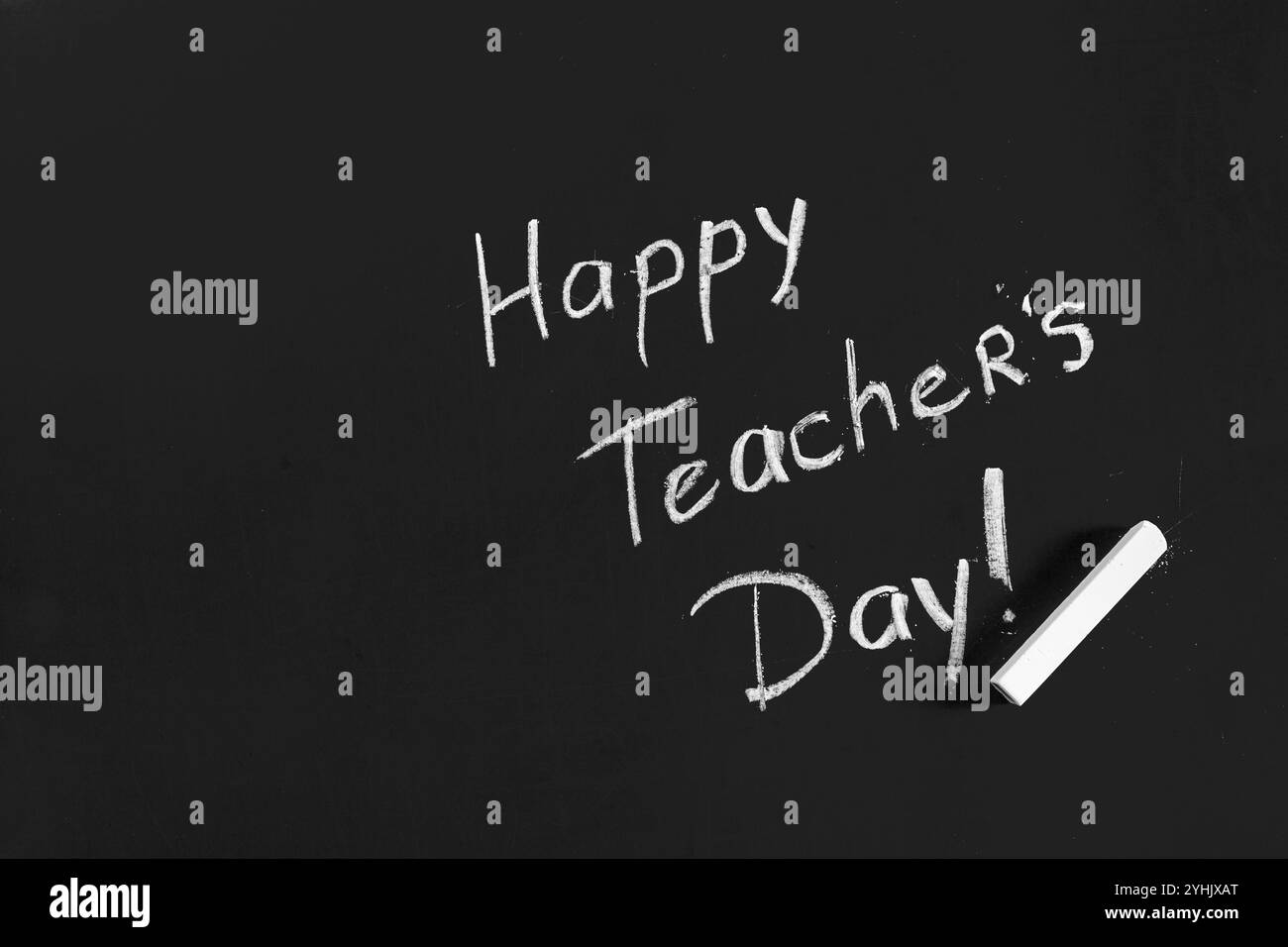 scrivi il giorno felice degli insegnanti scritto su una lavagna Foto Stock