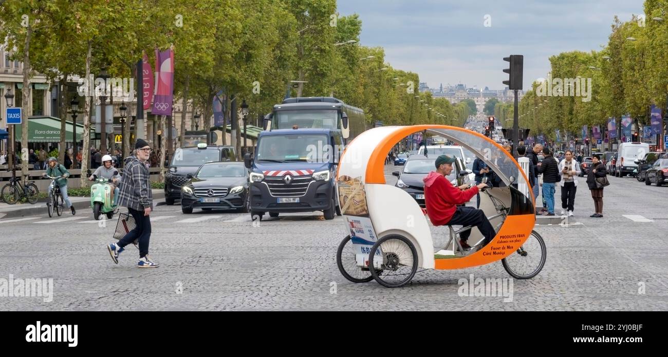 Ciclismo risciò Parigi, Francia Foto Stock