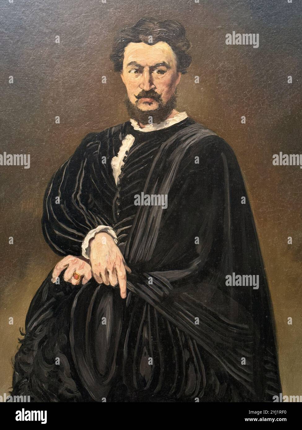 Il tragico attore, ritratto di un uomo in costume nero, collant e spada. Di Edouard Manet. Al museo National Gallery of Art di Washington DC. Foto Stock