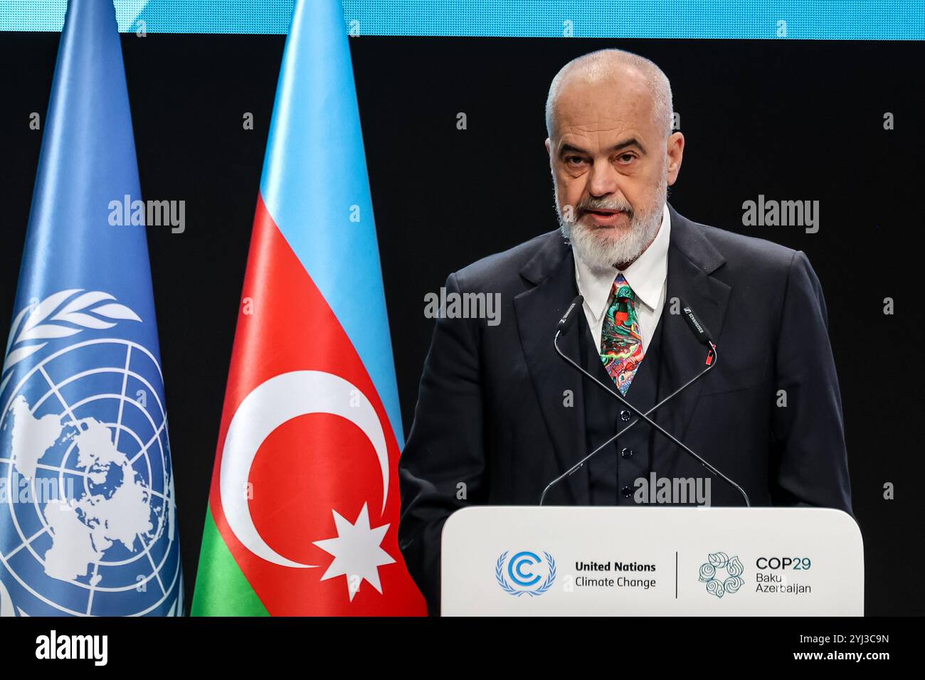 Baku, Azerbaigian. 13 novembre 2024. EDI Rama, primo ministro albanese, interviene durante la prima parte del segmento ad alto livello della Conferenza delle Nazioni Unite sui cambiamenti climatici nella sala plenaria di Nizami durante la COP29, un evento tenuto dall'UNFCCC allo Stadio Olimpico di Baku. La COP29, in vigore dal novembre 11-22, si concentra sulla compensazione delle emissioni di carbonio e sui finanziamenti per la sostenibilità e la mitigazione. Credito: SOPA Images Limited/Alamy Live News Foto Stock