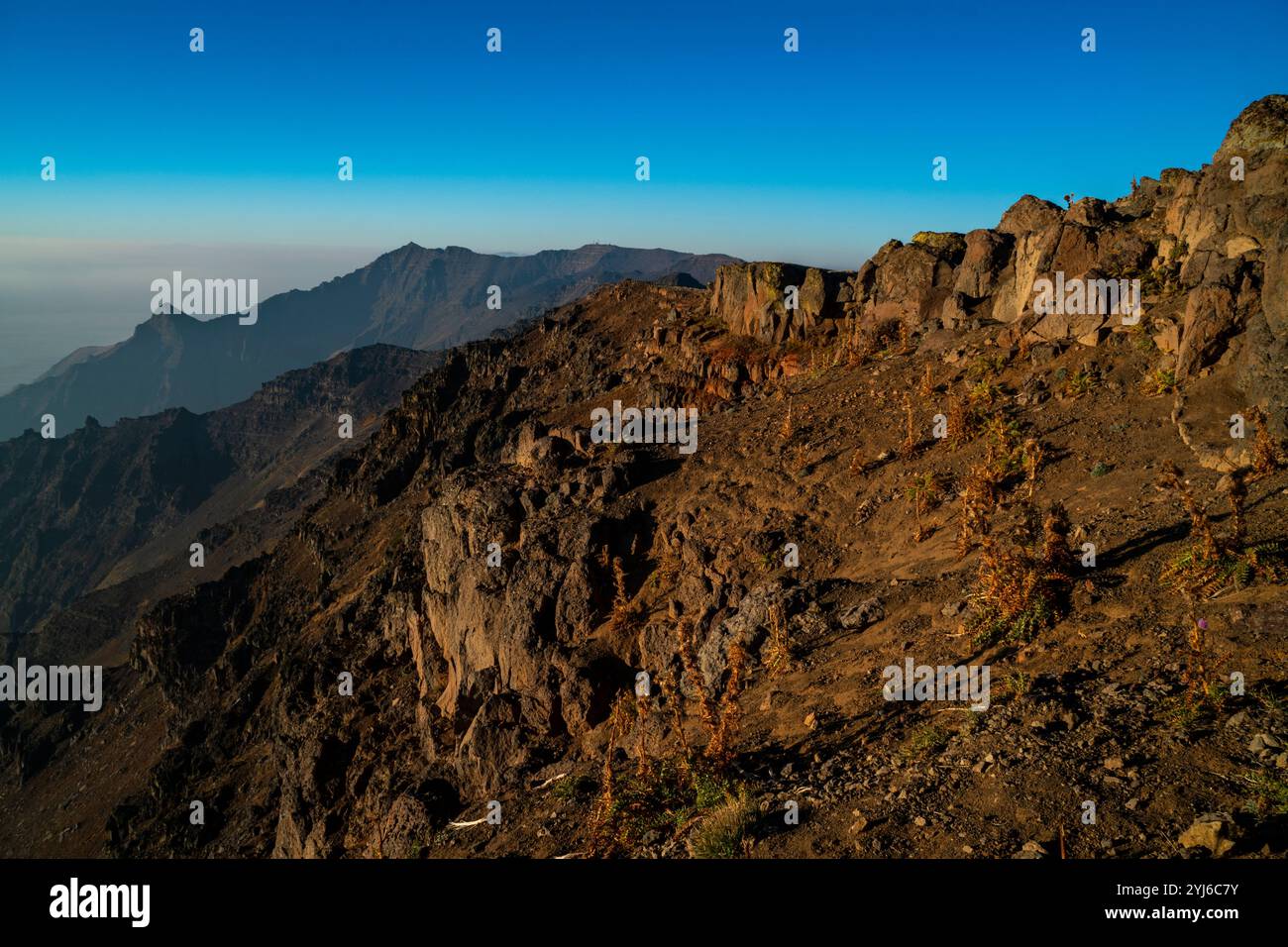 Il sole della mattina presto illumina l'East Rim della Steens Mountain, Oregon meridionale. Foto Stock