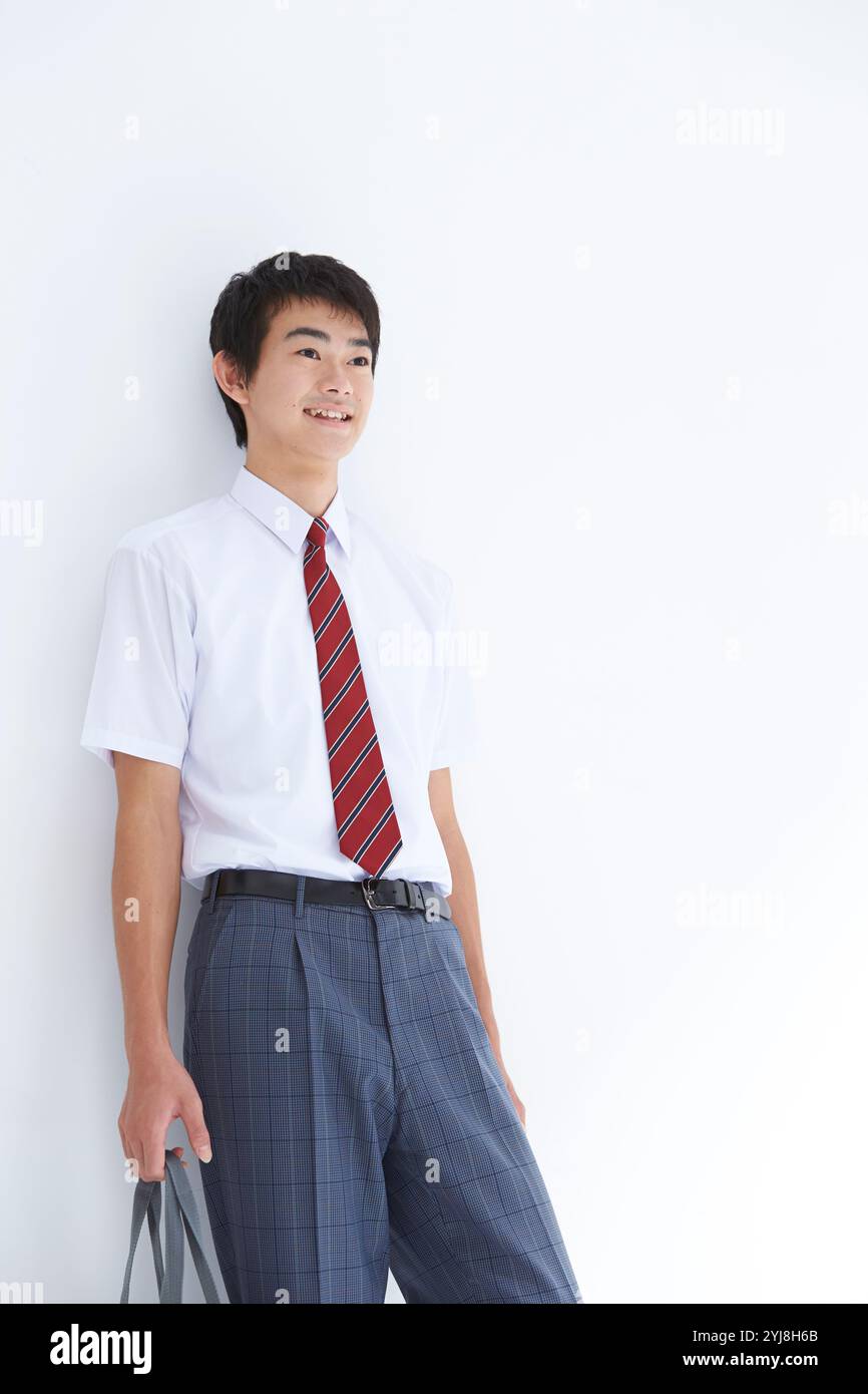 Studente di scuola superiore maschile Foto Stock