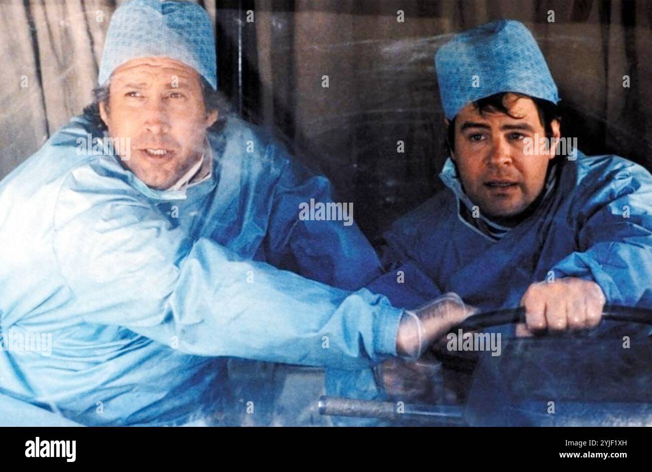 SPIE COME la US 1985 Warner Bros. Film con Chevy Chase a sinistra come Ernest Fitz-Hume e Dan Aykroyd come Austin Millbarge Foto Stock