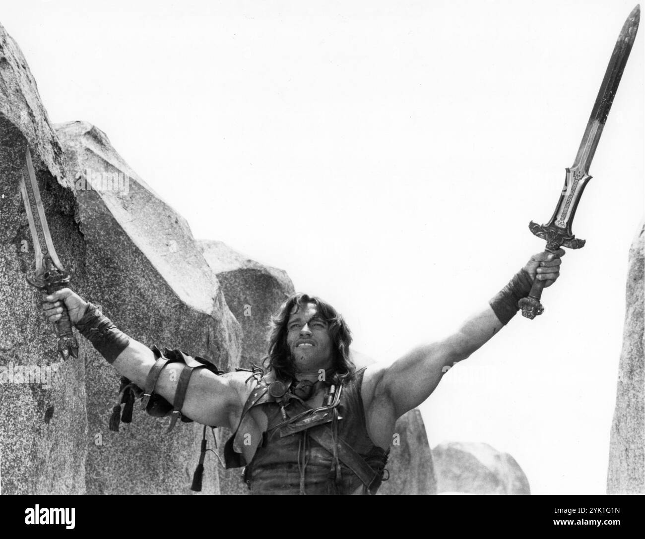 ARNOLD SCHWARZENEGGER in una scena di CONAN IL BARBARO 1982 regista JOHN MILIUS personaggio creato da ROBERT E. HOWARD Costume Design JOHN BLOOMFIELD Music BASIL POLEDOURIS Universal Pictures Foto Stock