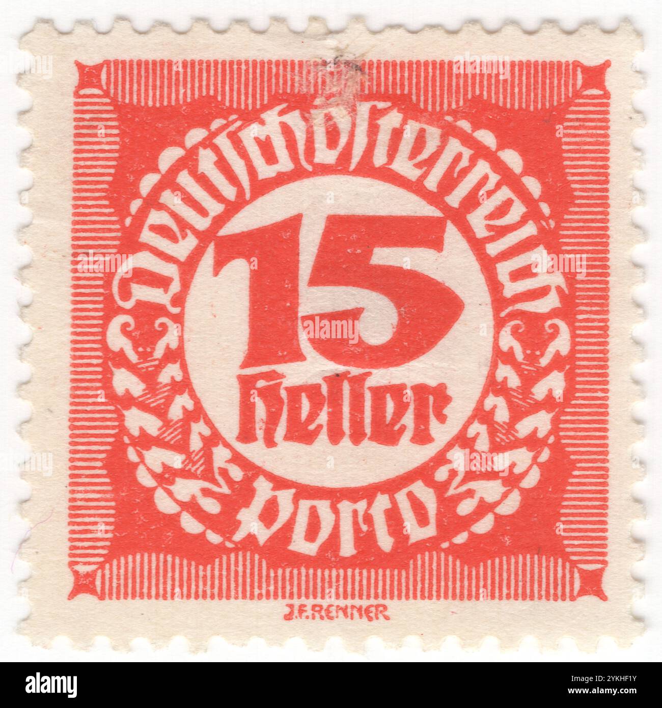 AUSTRIA — 1920: 15 heller francobollo rosso brillante che raffigura un numero di valore (cifra) in una cornice circolare con ornamento geometrico nello stile della lettera Nera, noto anche come scrittura gotica, minuscolo gotico o tipo gotico, era una scrittura usata in tutta l'Europa occidentale. Insieme al tipo italico e al tipo romano, la lettera nera servì come uno dei caratteri più importanti nella storia della tipografia occidentale. Questioni della Repubblica Foto Stock