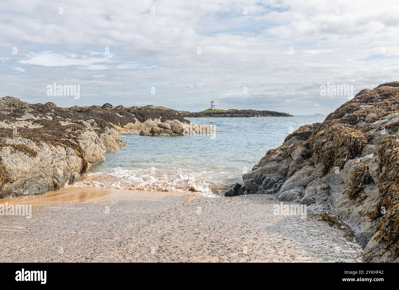 Faro di Elie Ness di fronte a Ruby Bay Wood Haven, Elie, Fife, Scozia Foto Stock