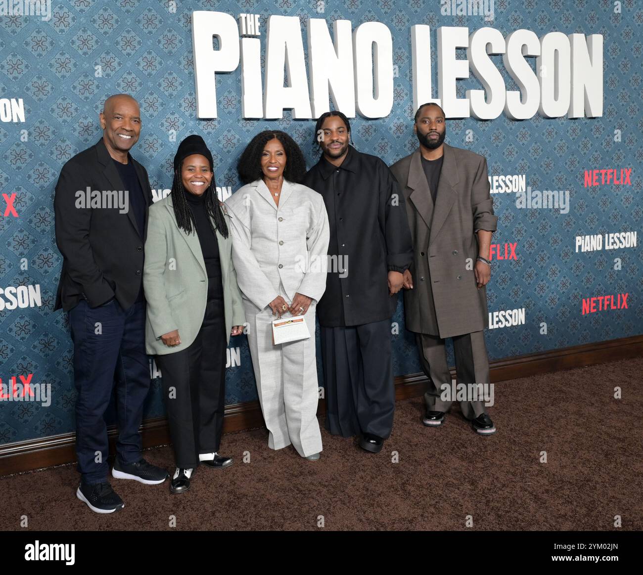 Los Angeles, Stati Uniti. 19 novembre 2024. LOS ANGELES, CA. 19 novembre 2024: Denzel Washington, Katia Washington, Pauletta Washington, Malcolm Washington e John David Washington alla prima di Los Angeles per la lezione di pianoforte all'Egyptian Theatre. Crediti fotografici: Paul Smith/Alamy Live News Foto Stock