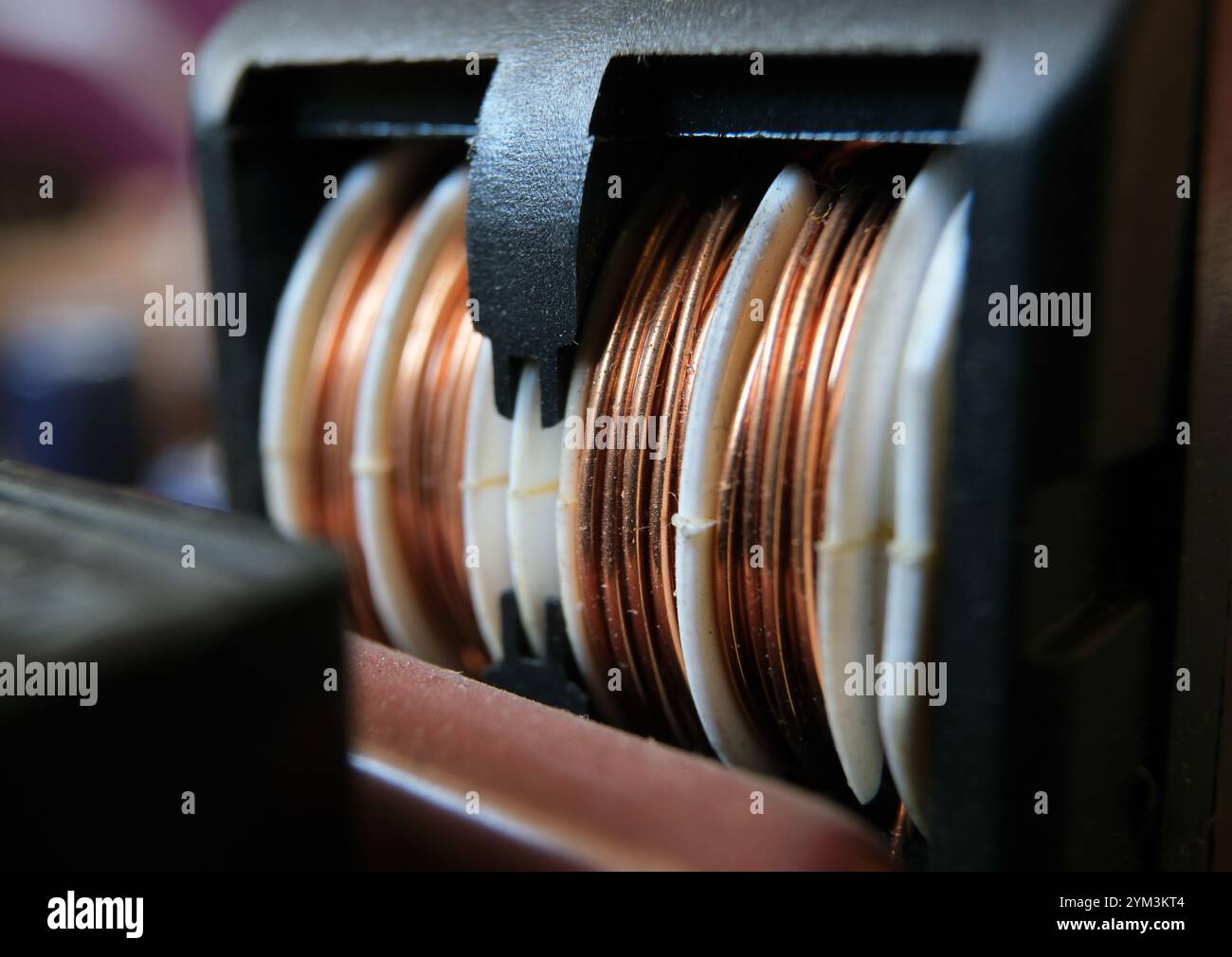 Avvolgimento di rame utilizzato nelle macchine industriali. Foto Stock