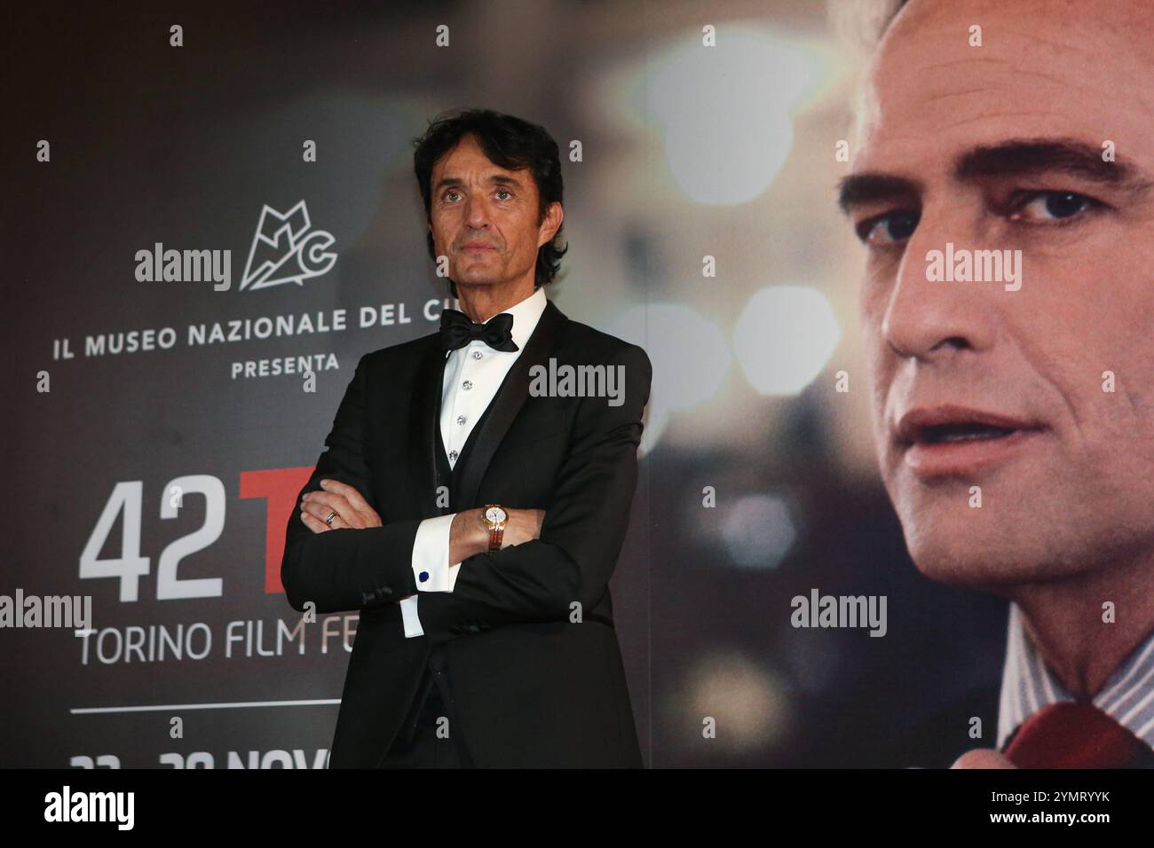 Torino, Italia. 22 novembre 2024. Giulio base partecipa al Red carpet della cerimonia di apertura del 42° Torino Film Festival al Teatro Regio di Torino. Credito: SOPA Images Limited/Alamy Live News Foto Stock